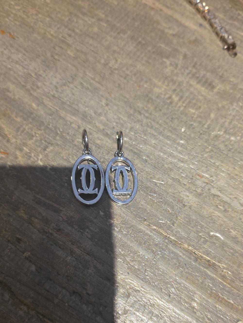 Cartier Style Silver Oval Logo Drop Earrings - Designer Style